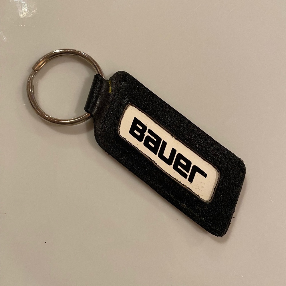 Vintage Bauer Supreme black and white hockey keychain with key loop